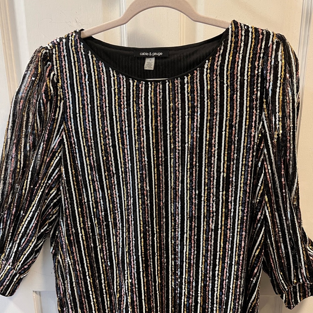 Party Blouse
Black with multi colored sequence for sparkle
Cable & Gauge
Size 1X